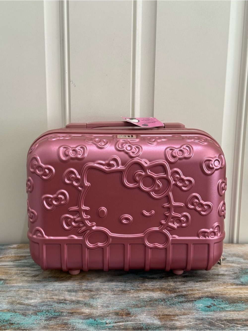 NWT FŪL Hello Kitty 13” Metallic Pink Hardshell Suitcase w/Logo Design